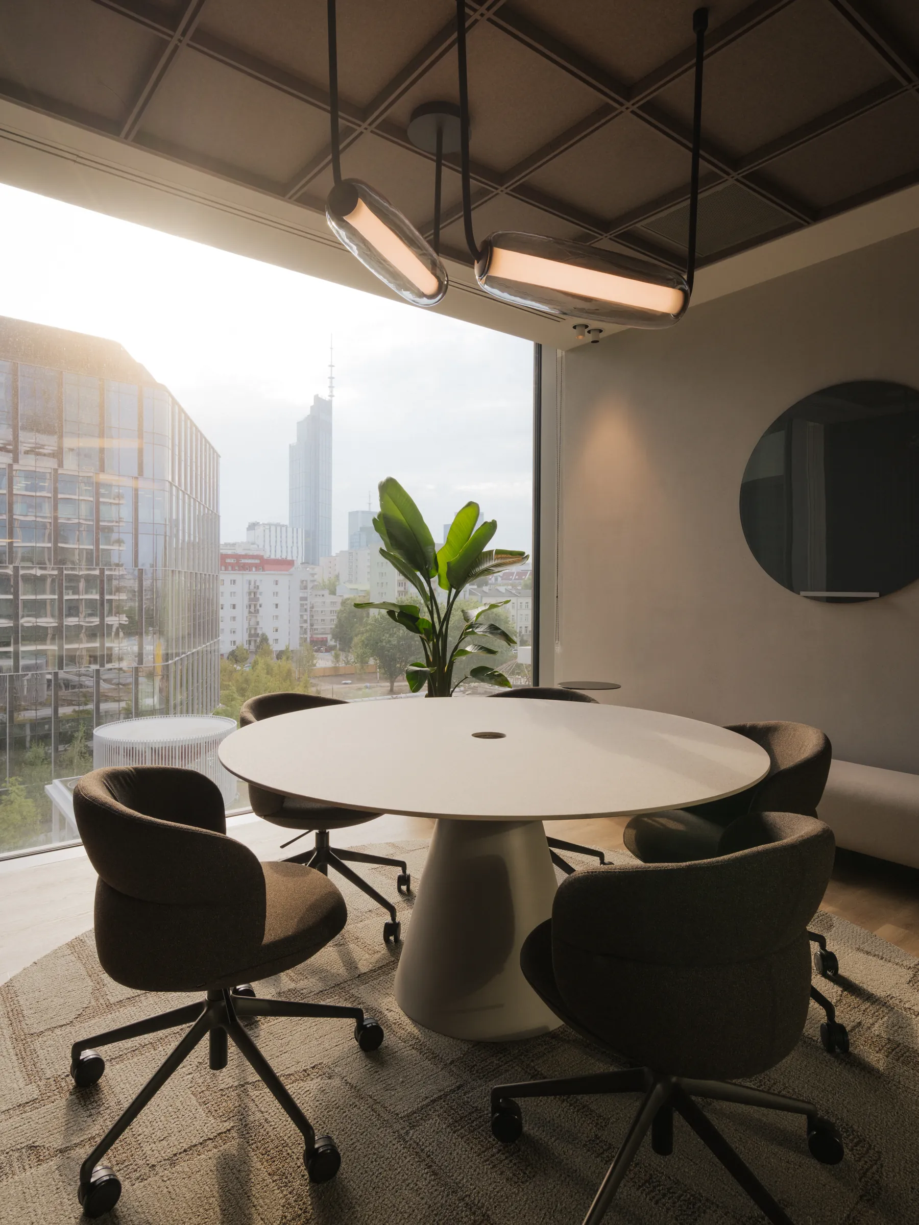 Fifth-floor meeting room with a window onto the towers