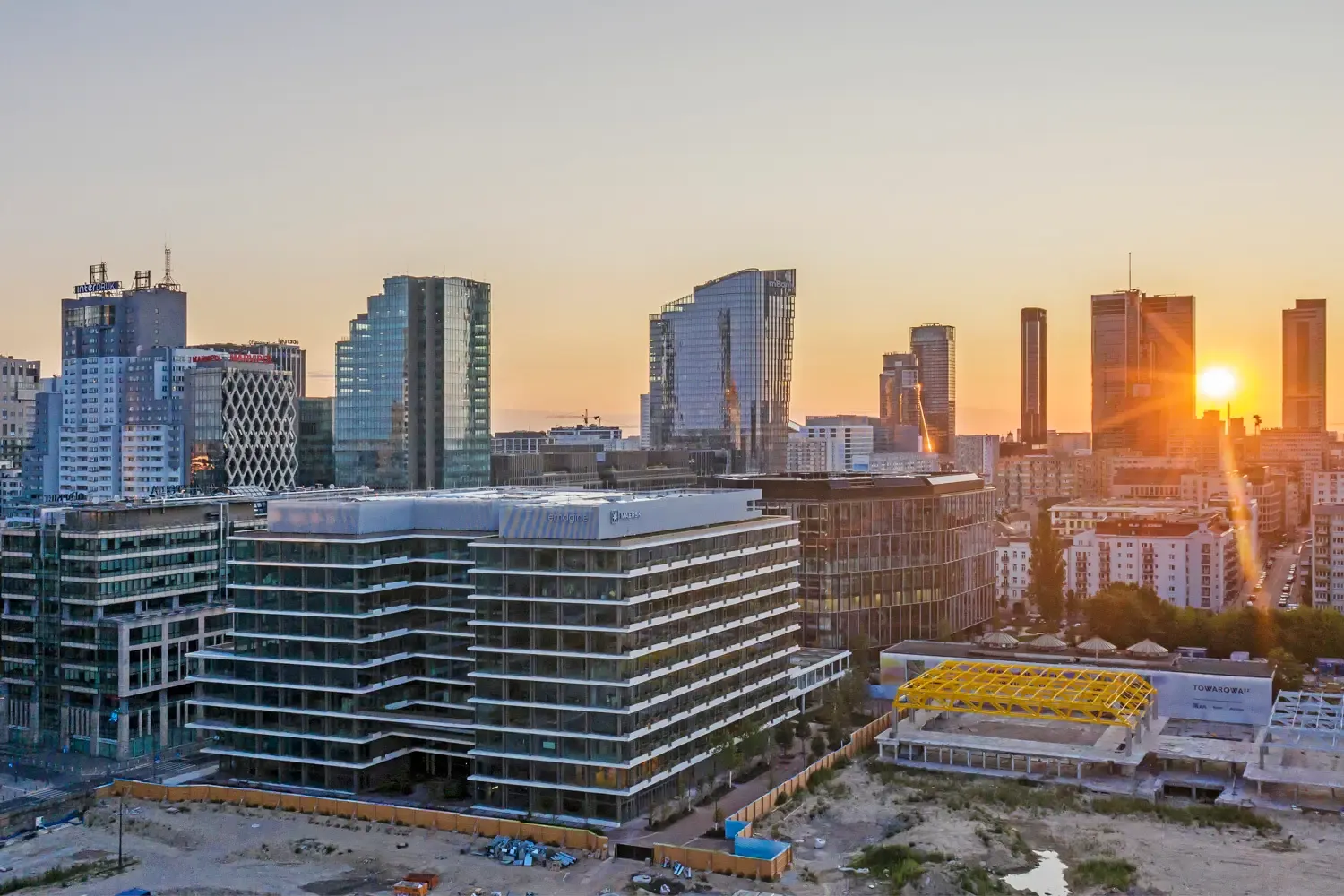 Sunset over the Wola towers, with Office House in the foreground